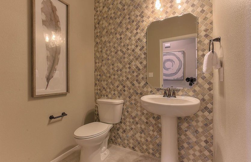 Powder bath on the first floor is conveniently located for guests.