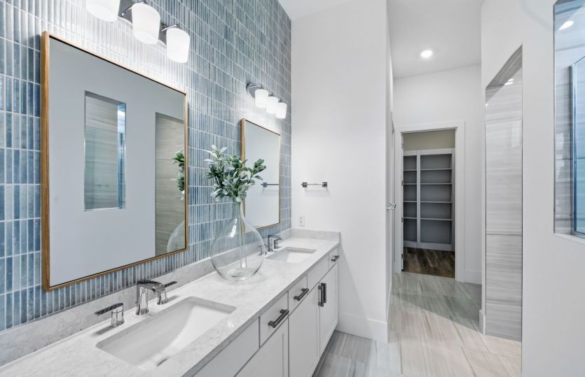 Owner's bathroom with dual sink vanity