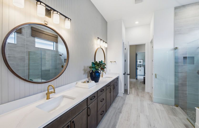 Owner's bathroom with dual sink vanity