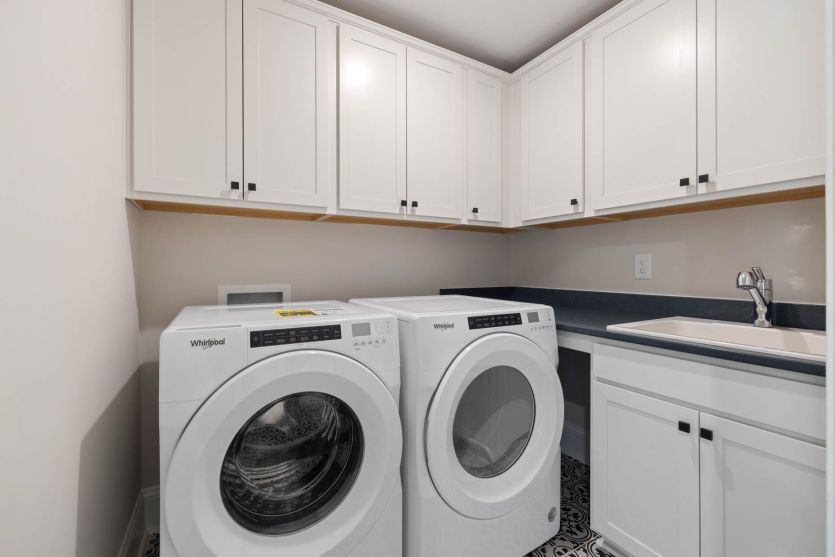 Upstairs Laundry Room is so Convenient - Model Representation