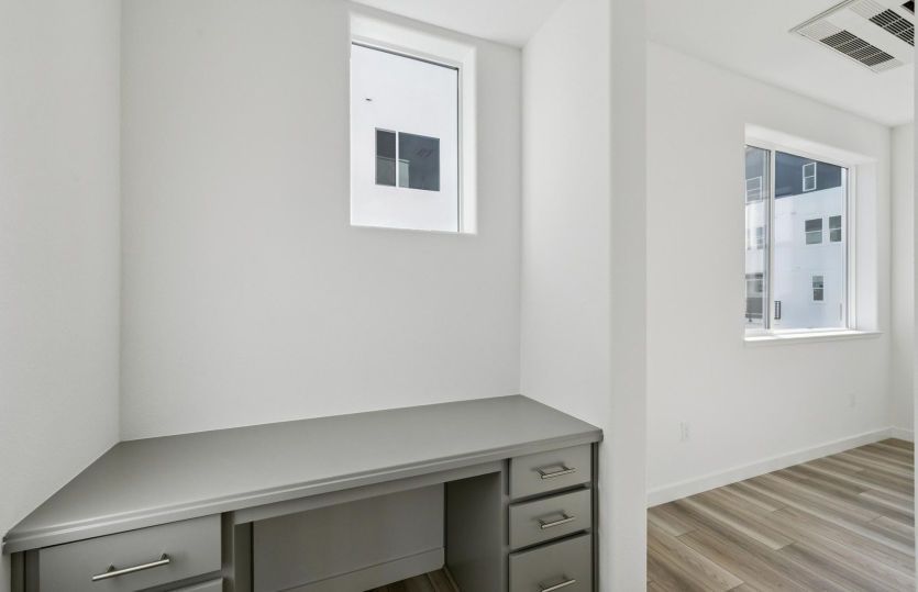 Built-in office space off dining area