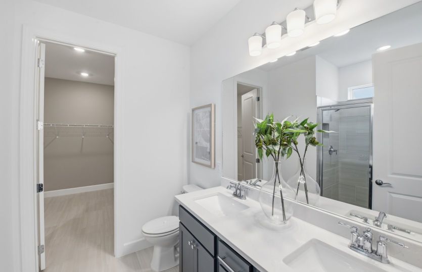 Owner's bathroom with dual sink vanity