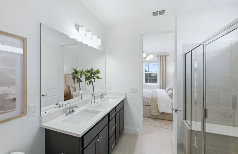 Owner's bathroom with dual sink vanity