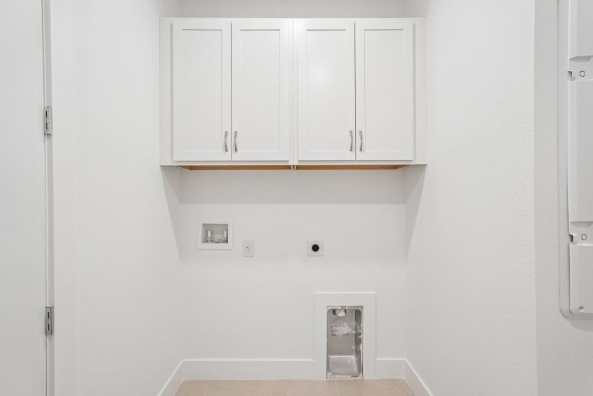 Laundry Room with Built-In Cabinets