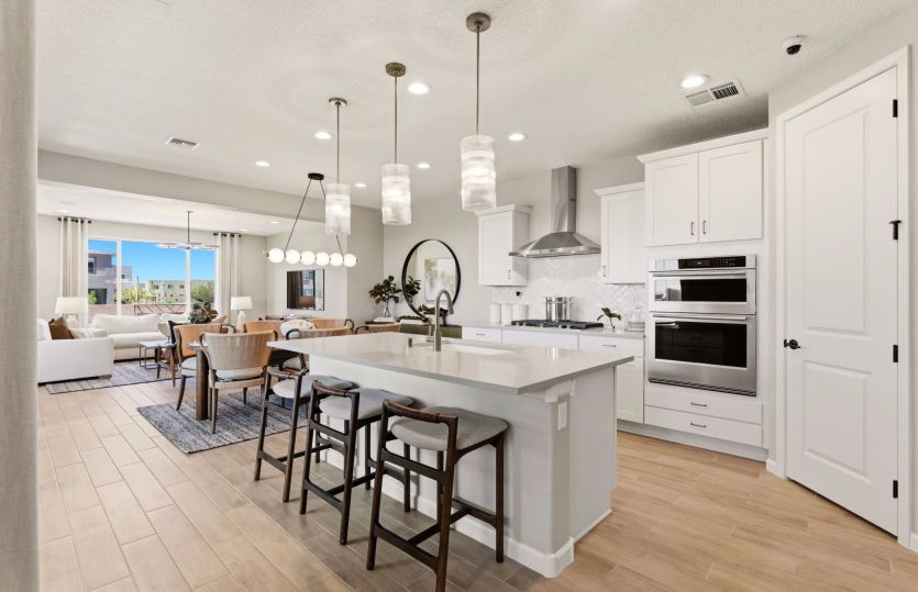 The openness from the kitchen and cafe allow for seamless transitions from room to room while entert