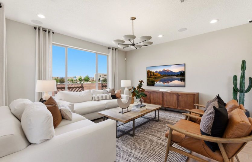 In the gathering room you'll enjoy just the right amount of space to cozy up to your favorite televi