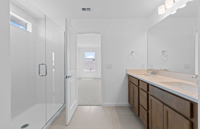 Owner's bathroom with dual vanity