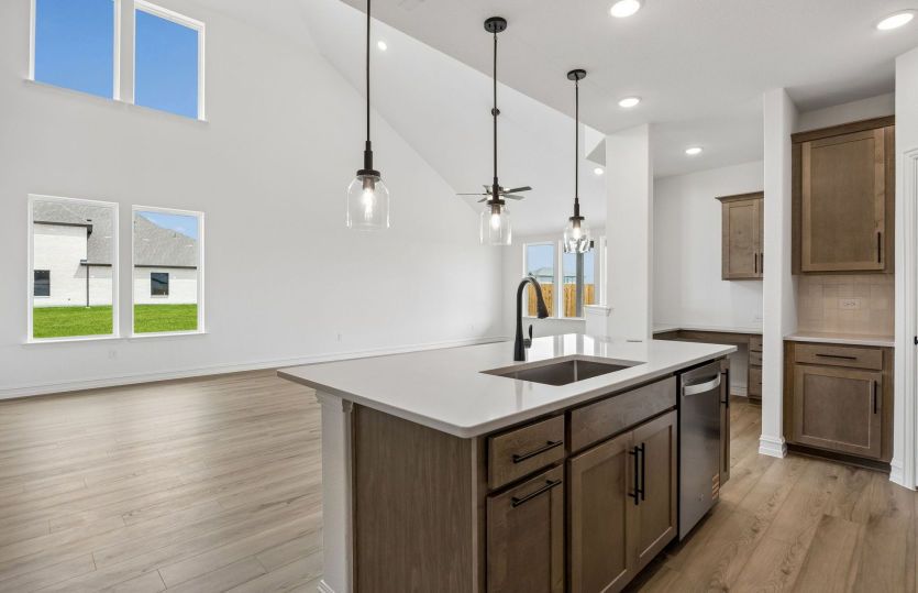 Kitchen with eat in bartop island