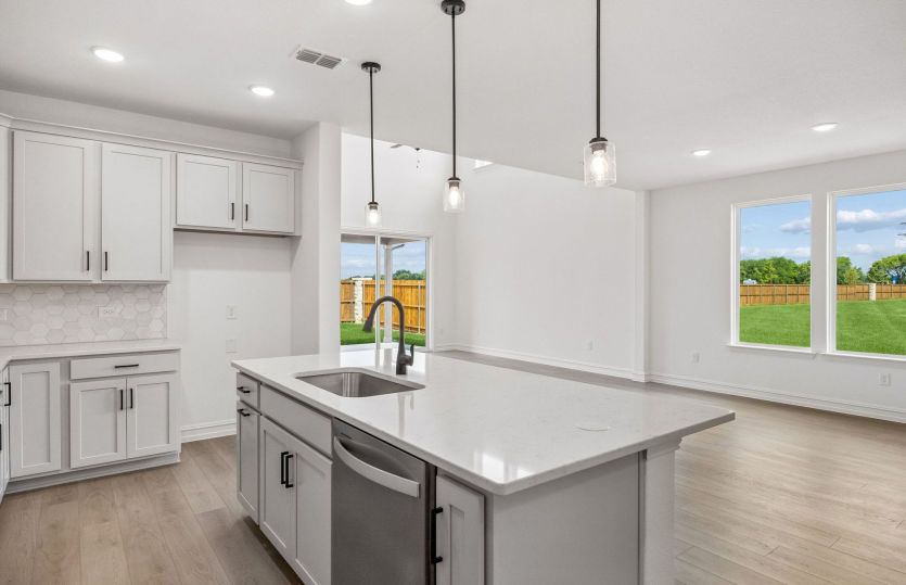 Kitchen overlooking gathering room