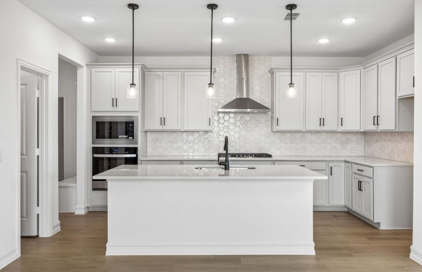 Kitchen with eat in bartop island