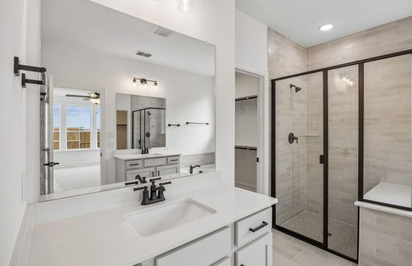 Owners bath with two vanities