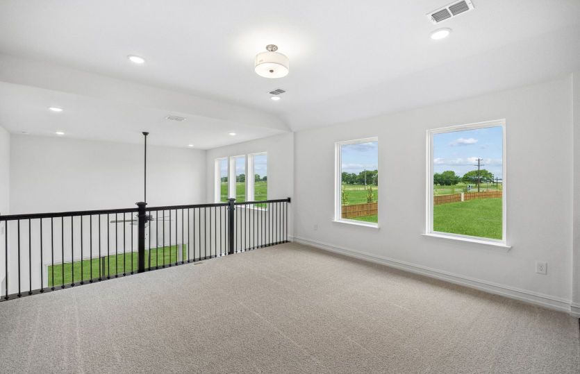 Loft on second level with large windows
