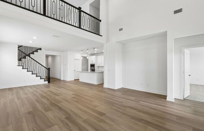 Spacious gathering room with beautiful flooring