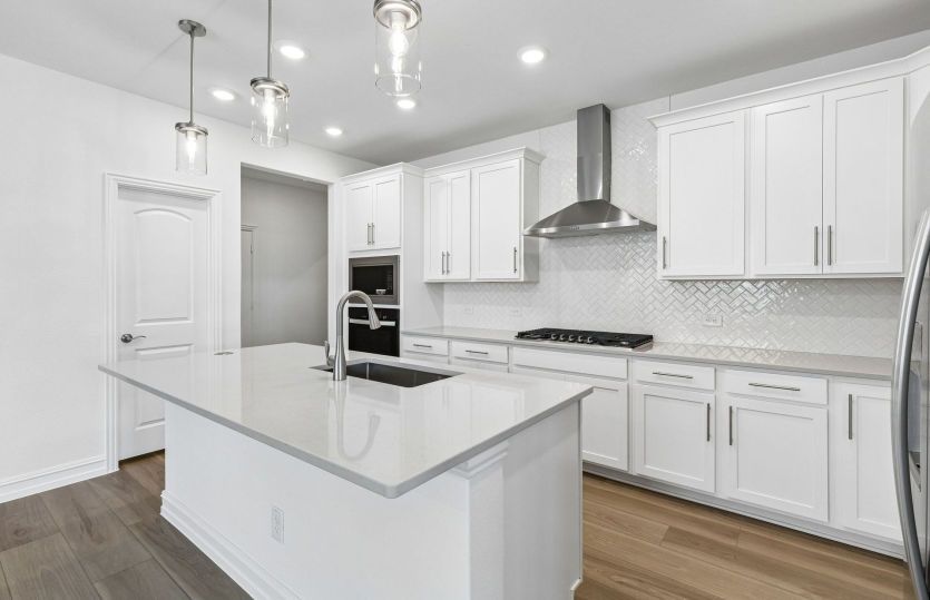 Kitchen with eat in bartop island