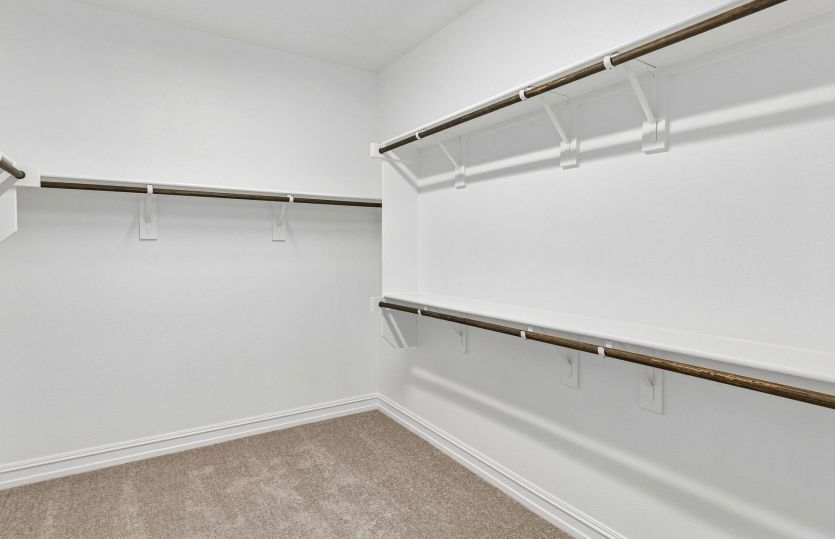 Walk in closet in owners suite