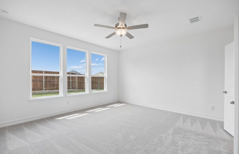Primary suite with large widows
