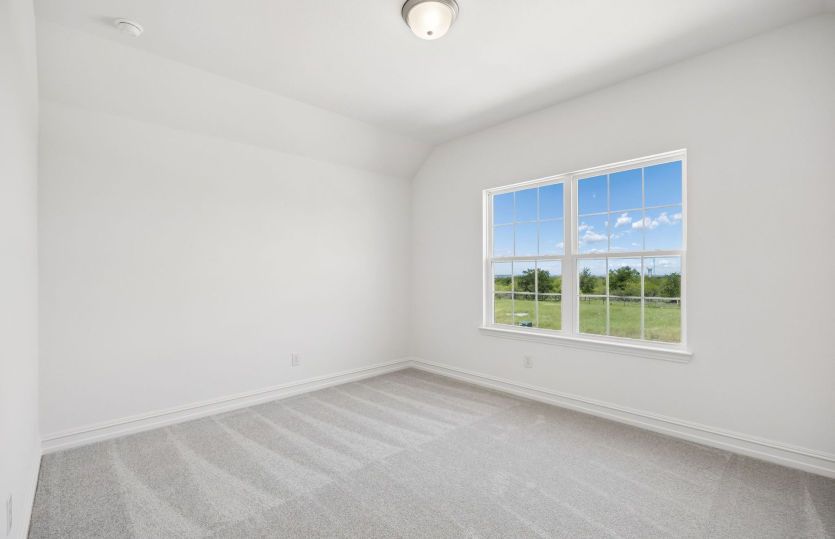 Secondary bedroom with large window