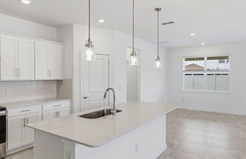 Kitchen that over looks the cafe and gathering room