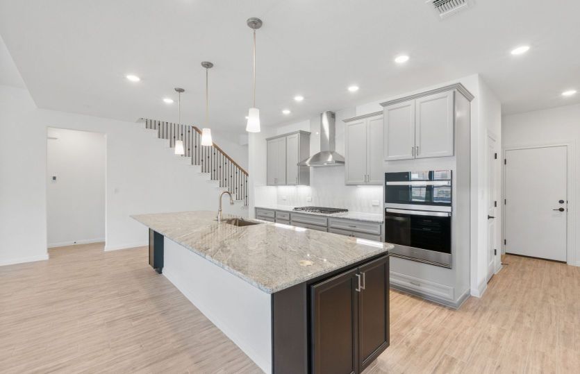 Representational Photo- Kitchen Open to the Gathering Space