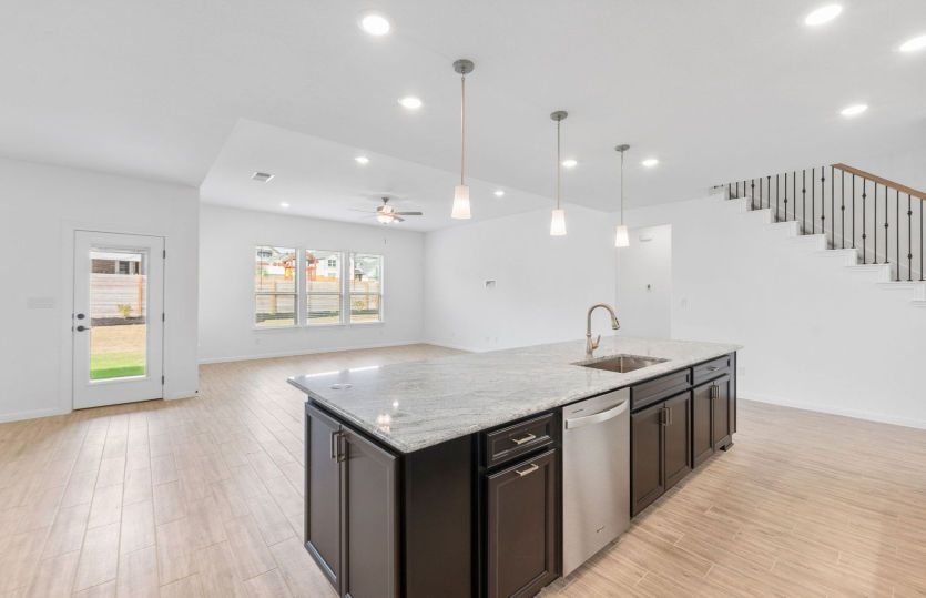 Representational Photo- Kitchen Open to the Gathering Space