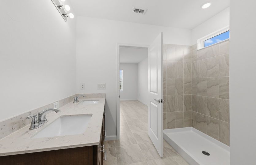 Walk-in shower in owner's bathroom