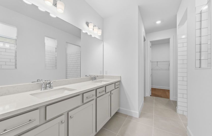 Owner's bathroom with dual-sink vanity
