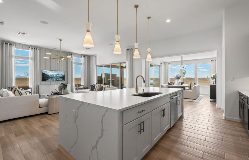 Award-winning Parklane home design is popular for the open gathering room, kitchen, café, and patio