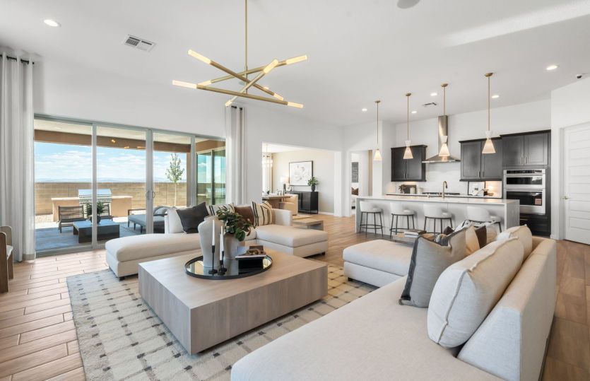 Gathering room modeled with extra seating perfect for lounging comfortably with the whole family.