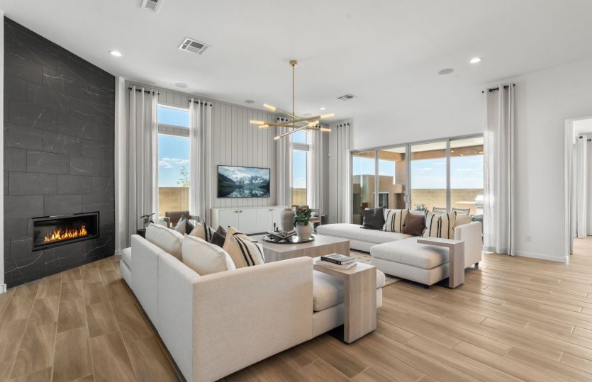 Interior fireplace in the gathering room adds warmth and ambiance for relaxing on cool New Mexico ev