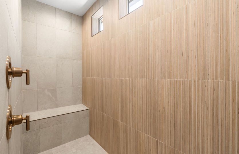 Owner's bath featuring a large walk-in shower.