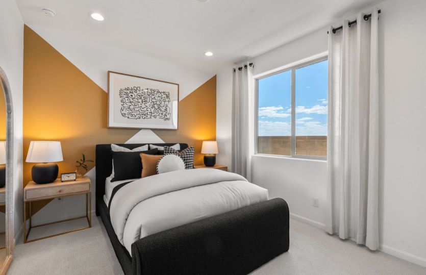 Third bedroom features a large window for plenty of natural light.