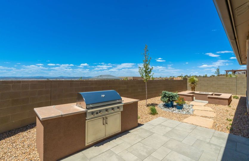 Outdoor entertaining is fun thanks to the versatile covered patio and large backyard.