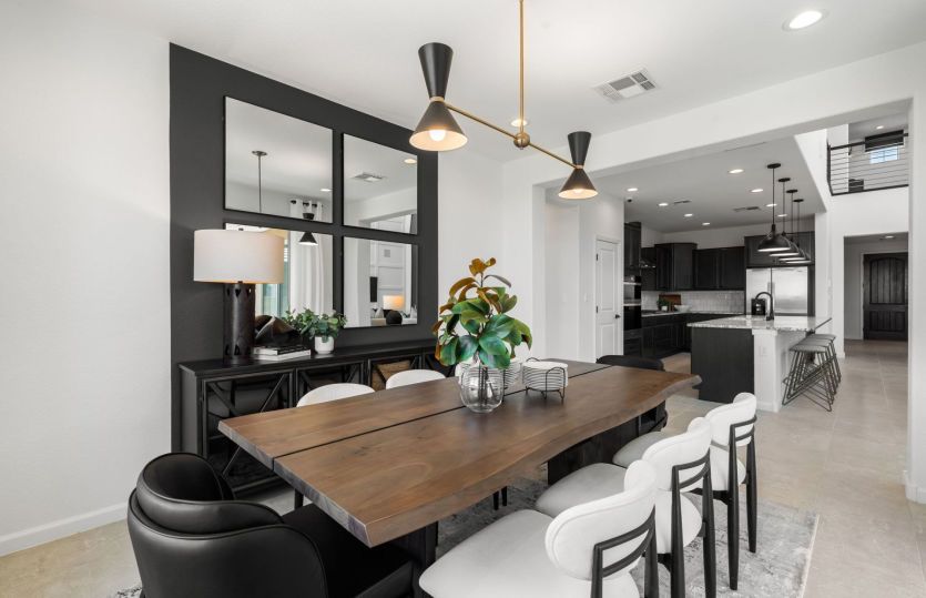 Choose to enjoy casual meals at the kitchen island countertop or in the cafe just off the kitchen.