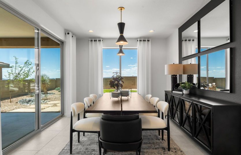 Great sized dining room off the kitchen includes access to the backyard and covered patio through th
