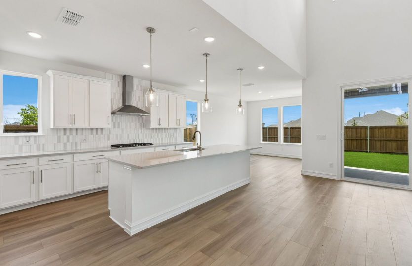 Beautiful kitchen with eat-in bartop island
