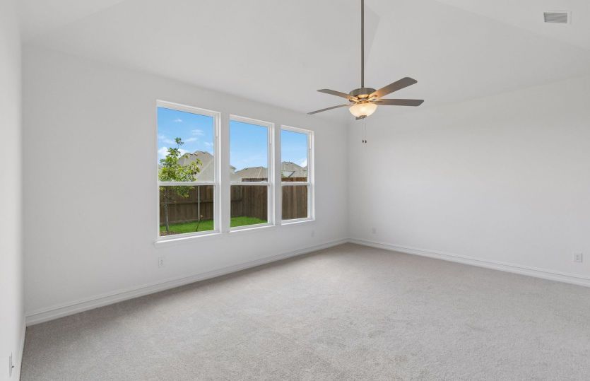 Primary suite with large windows