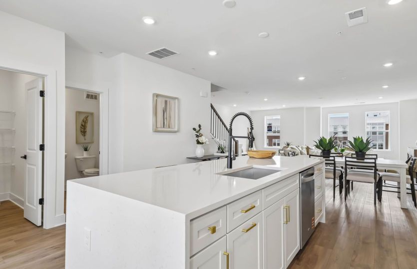 Gourmet Kitchen Opens to the Café and Gathering Room - Actual Home