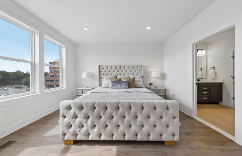 Owner's Suite with Luxurious Bath and Dual Walk-In Closets - Actual Homes