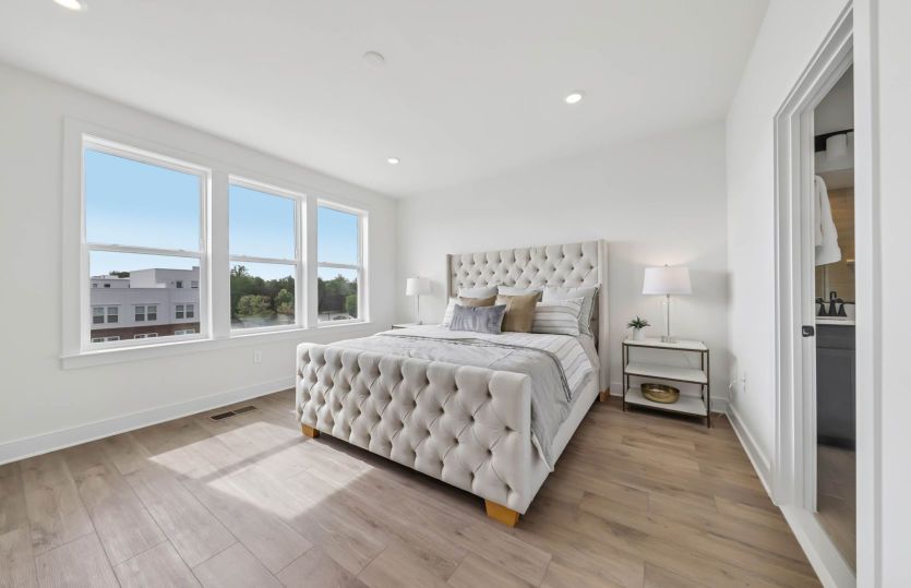 Owner's Suite with Luxurious Bath and Dual Walk-In Closets - Actual Homes
