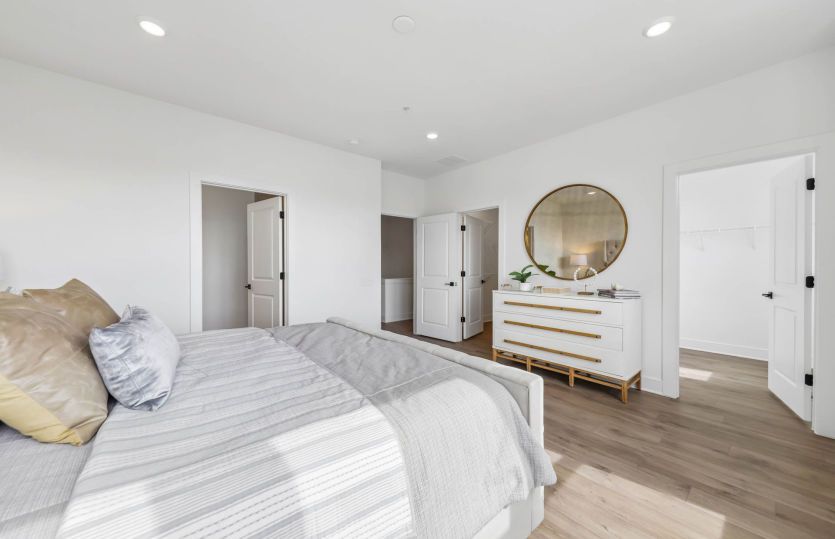 Owner's Suite with Luxurious Bath and Dual Walk-In Closets - Actual Homes