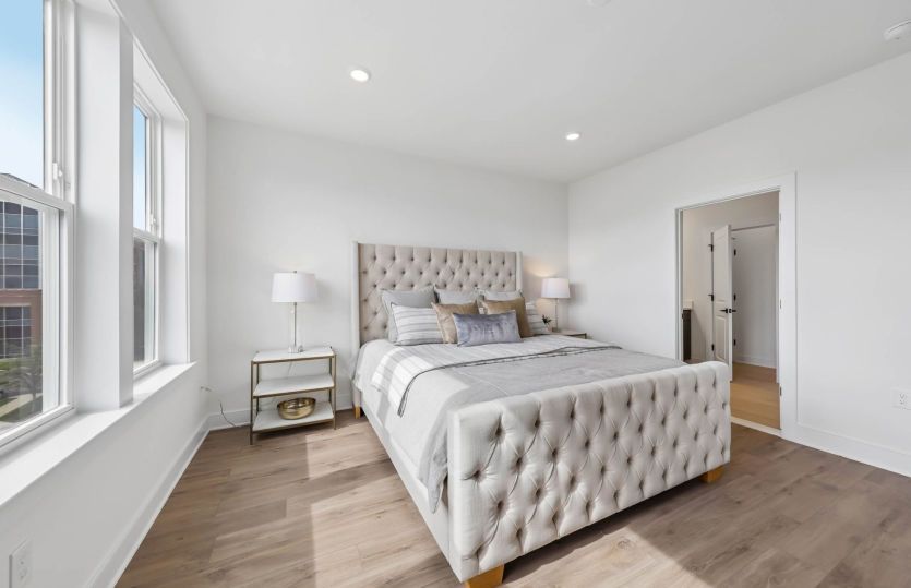 Owner's Suite with Luxurious Bath and Dual Walk-In Closets - Actual Homes