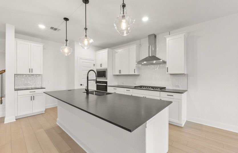 Representative Photo- Kitchen Open to the Gathering Space