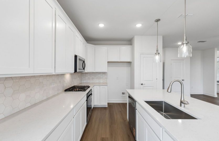 Abundant cabinet space in kitchen
