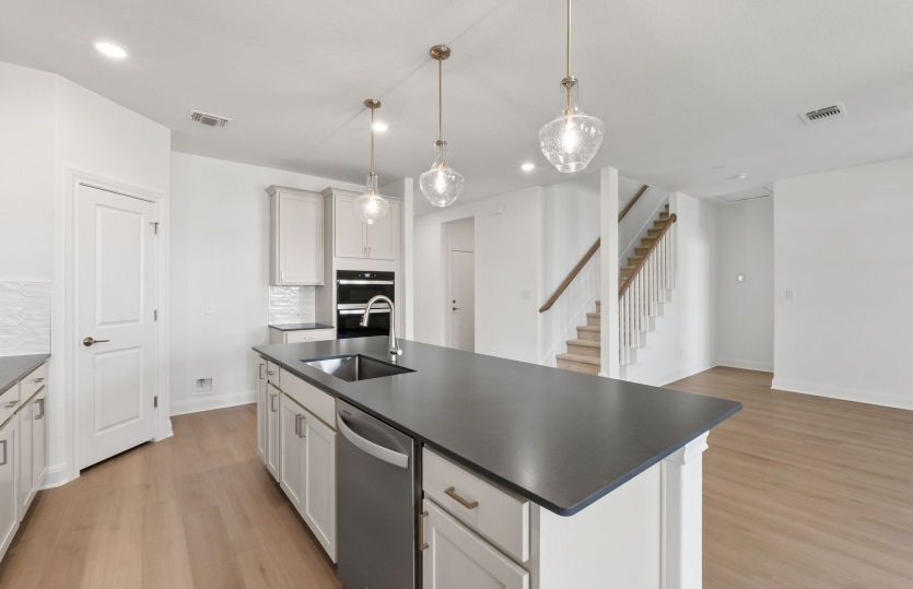 Representational Photo- Kitchen Open to the Gathering Space