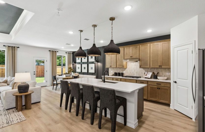 Beautiful pendent lighting in kitchen *model representation
