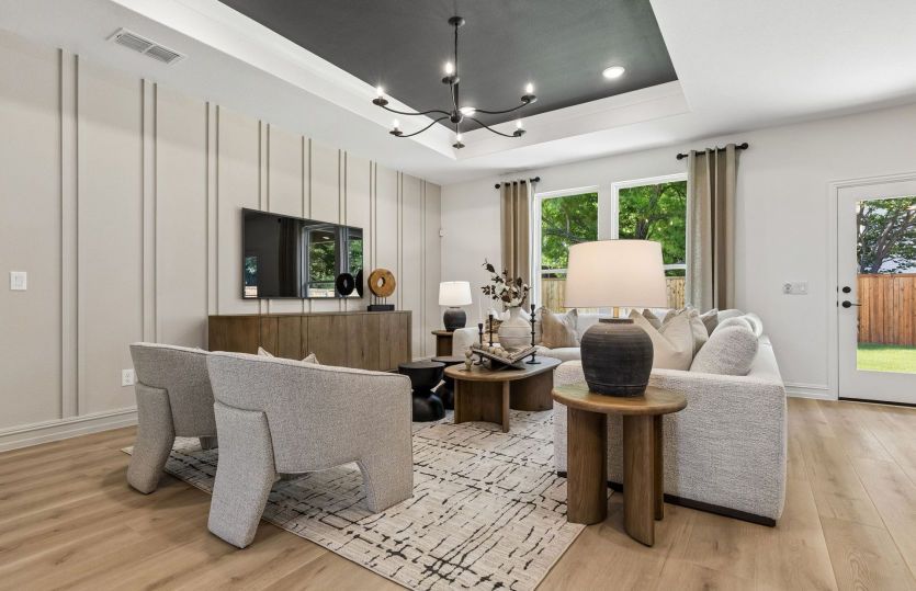 Spacious gathering room with beautiful flooring *model representation