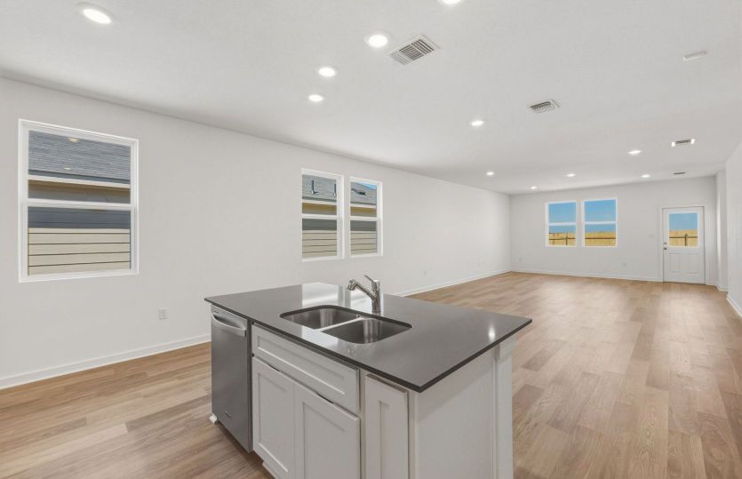 Representational Photo- Kitchen Open to the Gathering Space