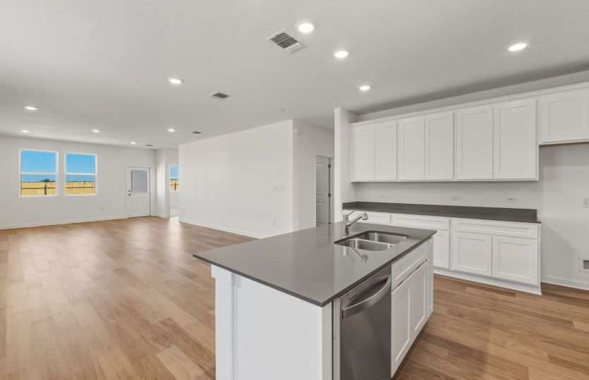 Representational Photo- Kitchen Open to the Gathering Space