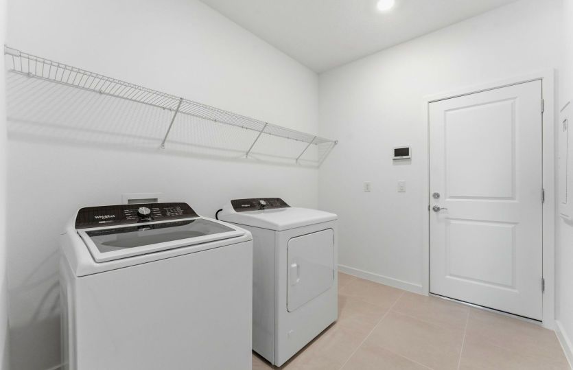 Laundry Room w/Whirlpool Washer and Dryer