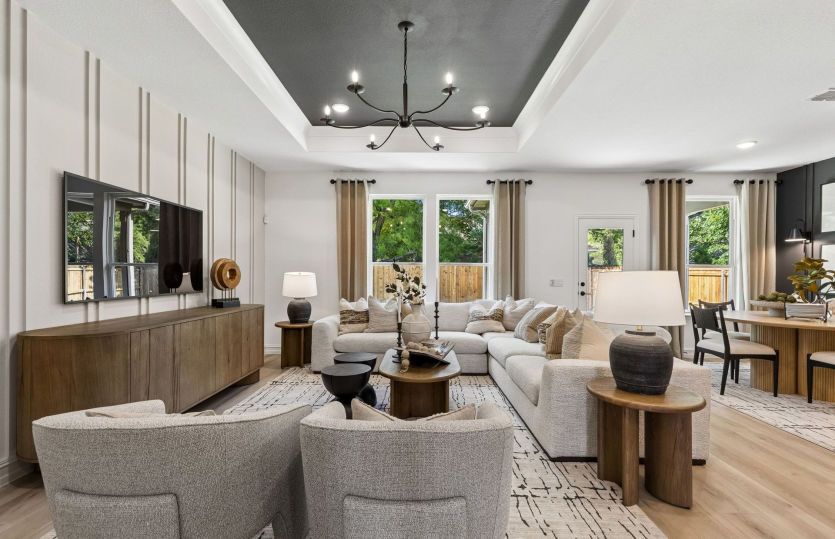 Spacious gathering room with large windows *model representation